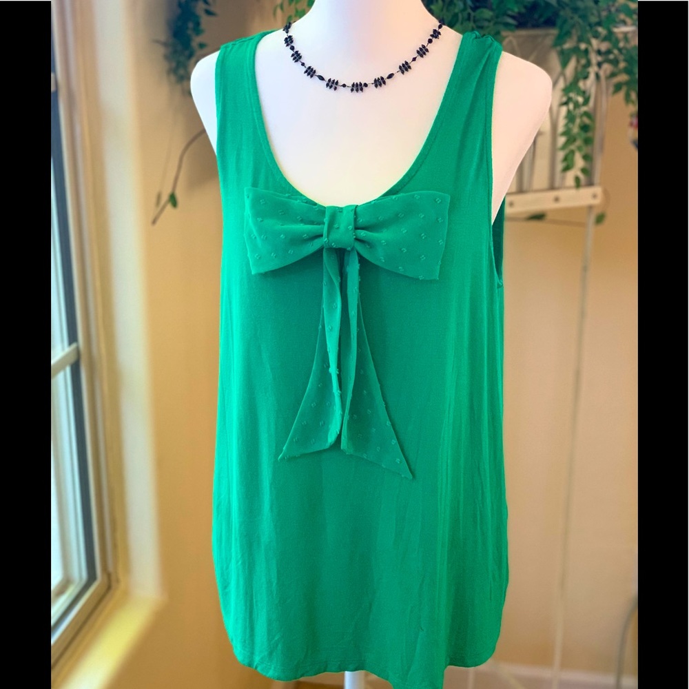 Green sleeveless blouse
